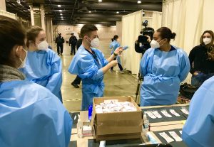 Nursing students receive vaccination training at the Pennsylvania Convention Center
