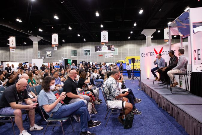 image of people watching a panel at the Western Foodservice & Hospitality Expo, which was purchased by Restaurant Events, LLC