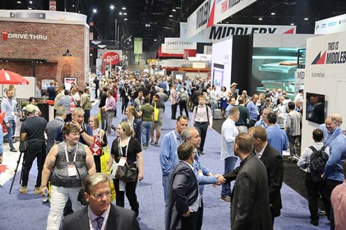 image of people on the show floor at the National Restaurant Show, which was acquired by Informa